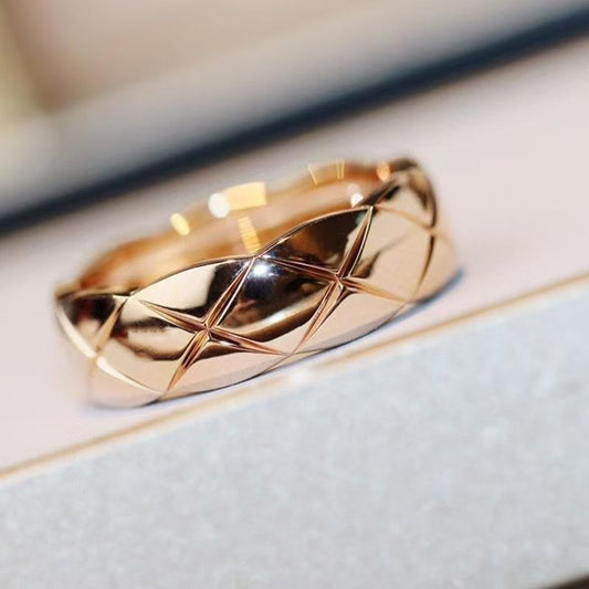 Chanel_COCO_CRUSH_RING with geometric design on a light background