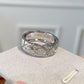 Chanel_COCO_CRUSH_RING_Diamondwith intricate design on a white surface