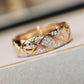 Chanel_COCO_CRUSH_RING_Diamond with diamond accents on a soft surface