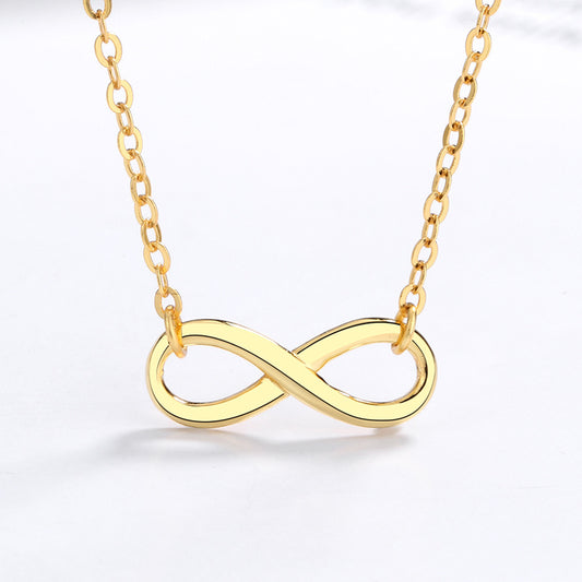 Necklace on soft grey or white background. Alt: “Chic Silver Dainty Infinity Necklace – 925 Sterling Silver.”