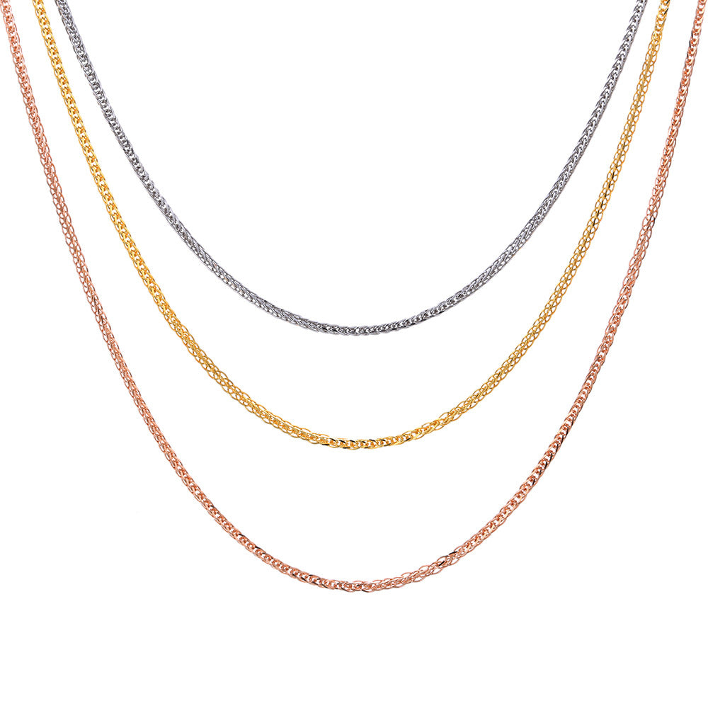 Silver chain on neutral background. Alt: “Chopin Chain in 925 Sterling Silver – Classic Link Necklace.”