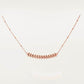 Clash de Cartier pendantRose gold necklace on a light gray background