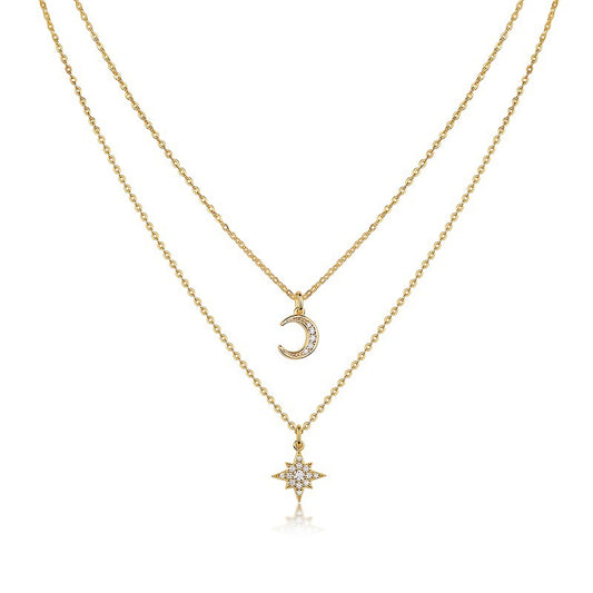 Clean white background — the crescent moon moissanite pendant and star pendant, each on its own chain, layered elegantly on a bust form. The moon catches light, showcasing sparkling moissanite accents; the star sits slightly lower or higher depending on chain lengths. Chains drape smoothly without tangling.