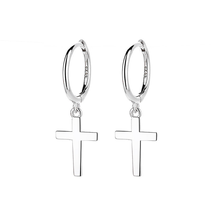 Gold cross hoop earrings on soft white background. Alt: “Gold Cross Hoop Earrings – Religious Symbol Jewelry.