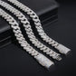 Two silver chain bracelets on a black background
