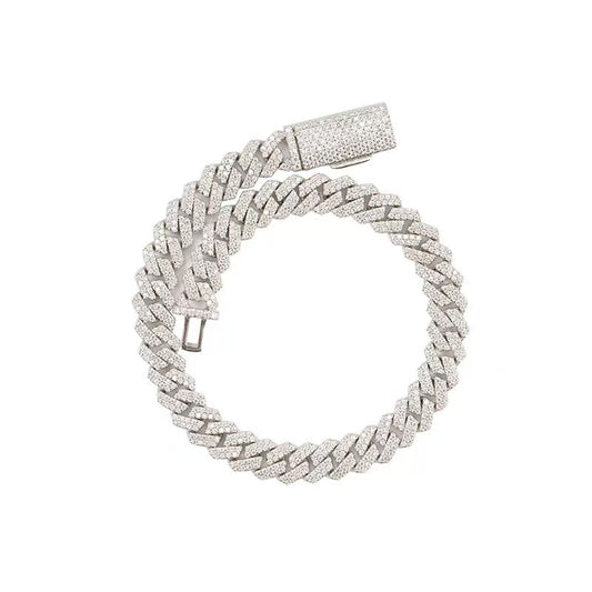 Silver braided bracelet with a clasp on a white background