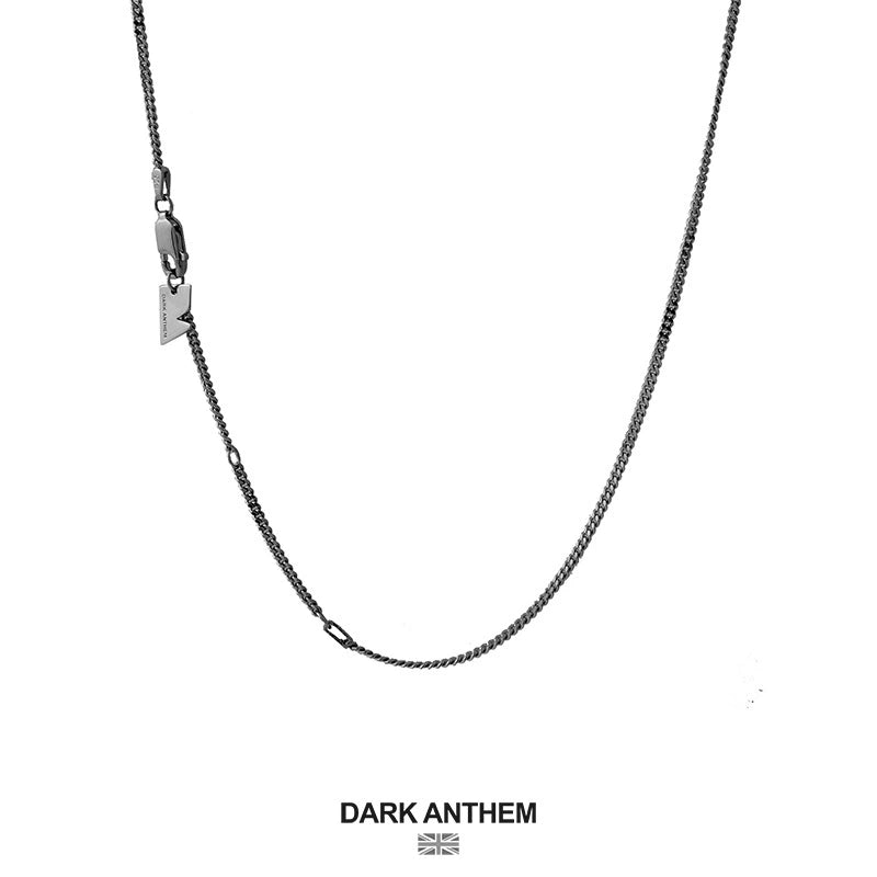 Silver chain necklace on a white background with 'Dark Anthem' branding.