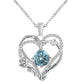 Heart-shaped silver pendant with blue gemstone and 'I love you' engraving on a white background