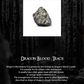 Dragon Blood Trace gemstone with descriptive text on a dark background