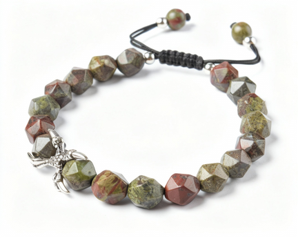 Beaded bracelet with green and brown stones on a white background