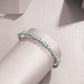 Diamond ring on a light pink cushion