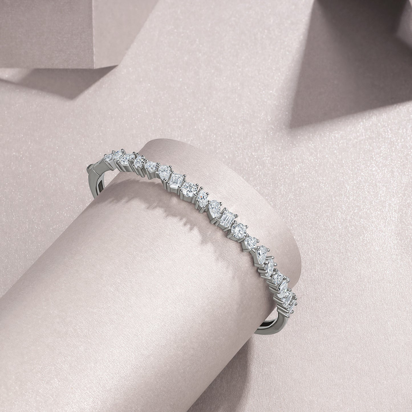 Diamond ring on a light pink cushion