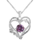 Heart-shaped silver pendant with purple gemstone and 'I love you' engraving on a white background