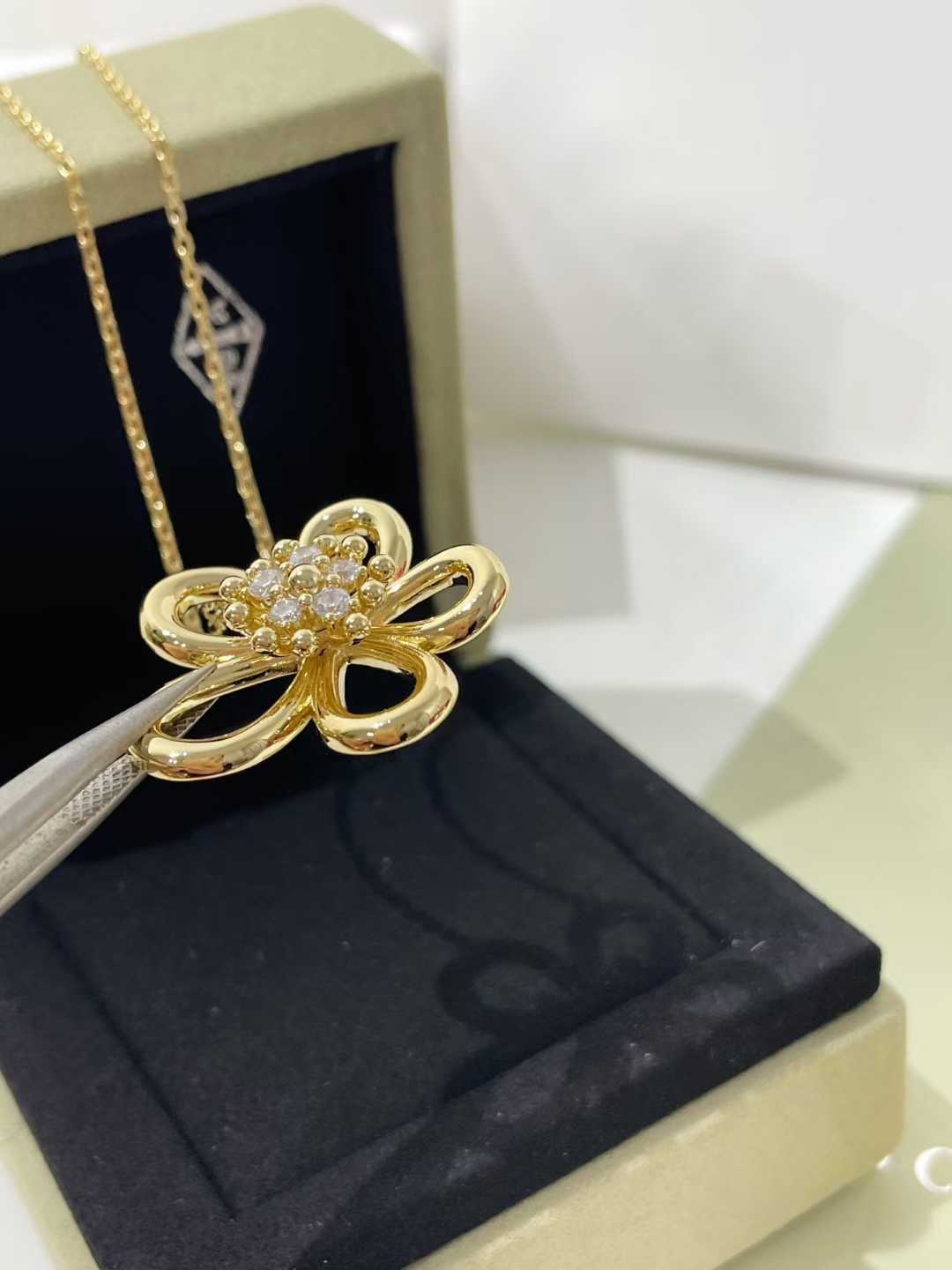 “Close-up of floral lace design cubic zirconia pendant”