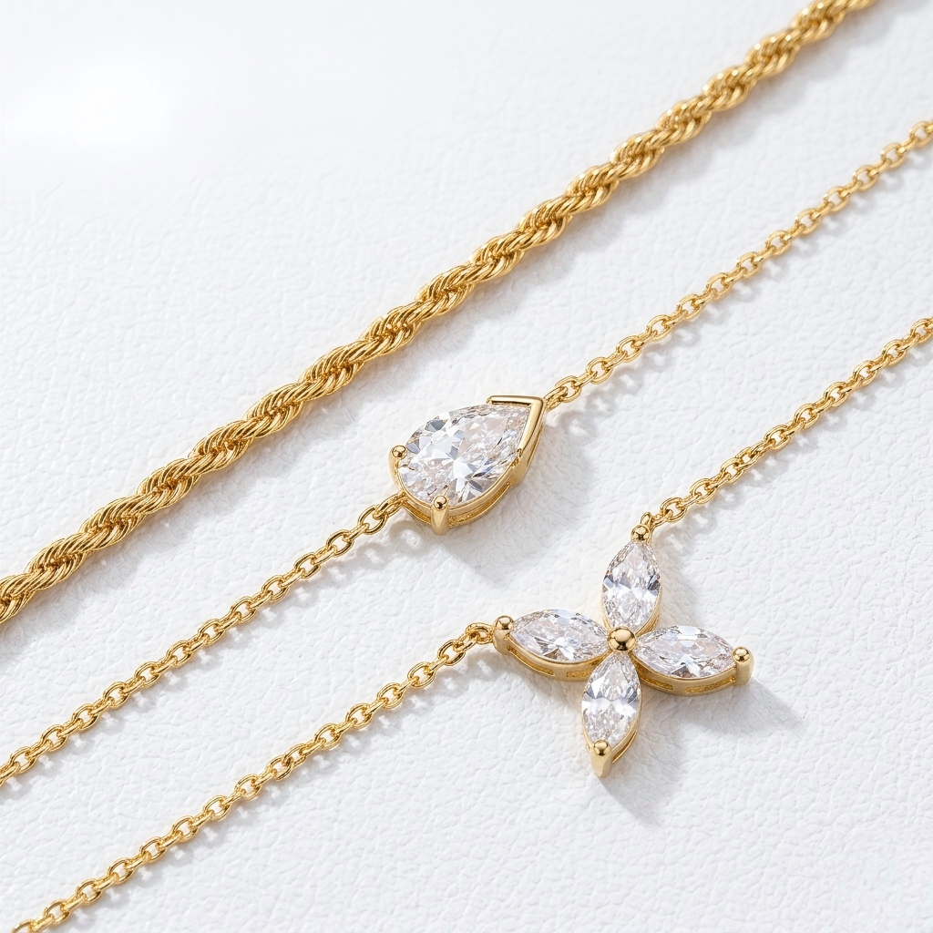 Macro, layered necklaces in 45° diagonal parallel layout, even spacing, mirror-polished gold, bright clean lighting, sharp stone brilliance, white textured background, soft shadow, ultra-detailed.