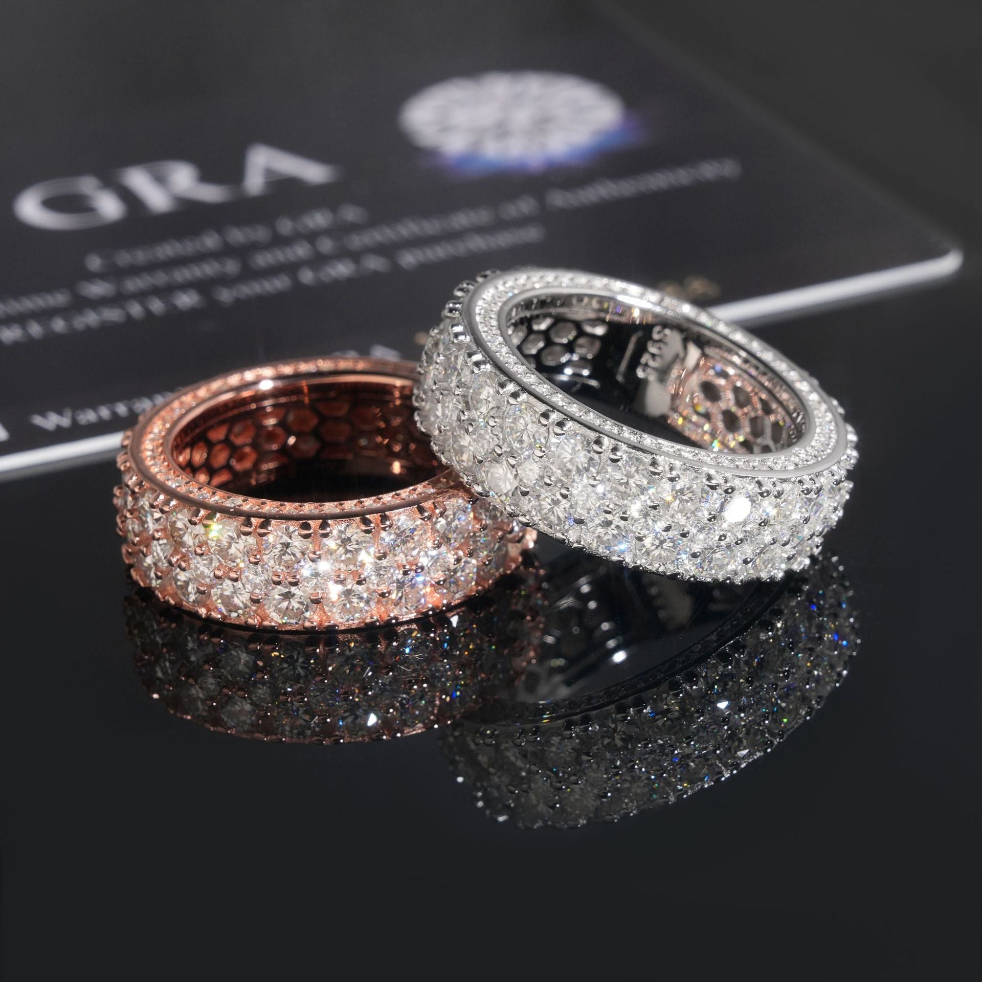Gold eternity band on dark background, showing continuous pavé sparkle. Alt: “Full-Pavé Moissanite Eternity Ring – 18K Gold Unisex.”