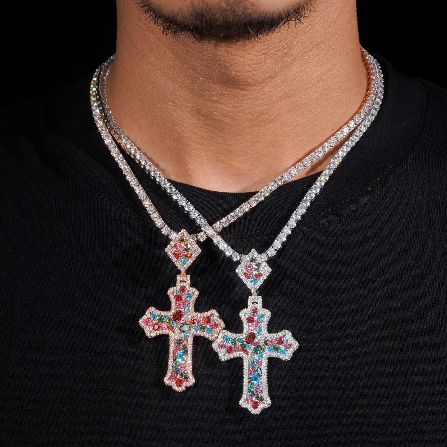 Necklace with cross pendants and gemstones on a black background