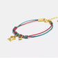  This Gold-Plated Sterling Silver Star Bracelet combines vibrant red and green braided cords with a finely crafted five-pointed star charm.