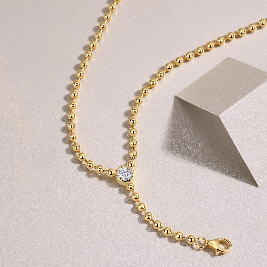 High-definition shot of the necklace laid flat on pure white.
