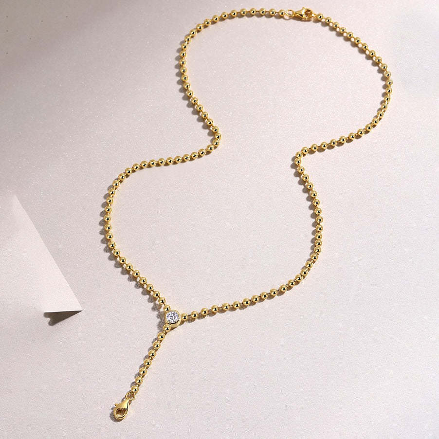 High-definition shot of the necklace laid flat on pure white.