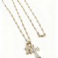 “Gold and silver double cross necklace flat lay showing zircon pendant and link chain”