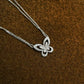 “Graff Butterfly Silhouette large diamond pendant necklace flat lay”