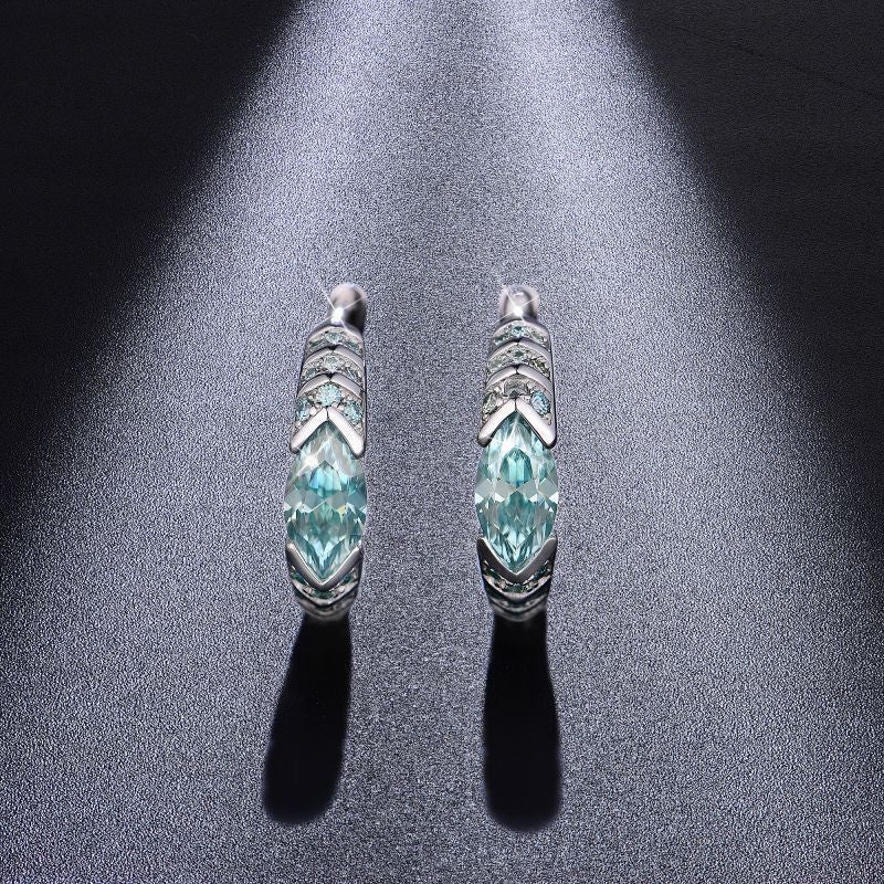 High-definition shot of the pair of earrings laid flat on pure white background, arranged symmetrically.
