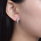 Female model wearing the earrings on ears.