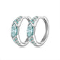 High-definition shot of the pair of earrings laid flat on pure white background, arranged symmetrically.