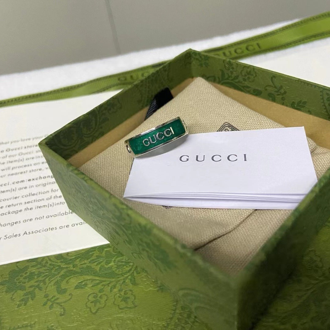 Gucci 925 Silver Turquoise Chain Ring and card in a green box with Gucci branding.
