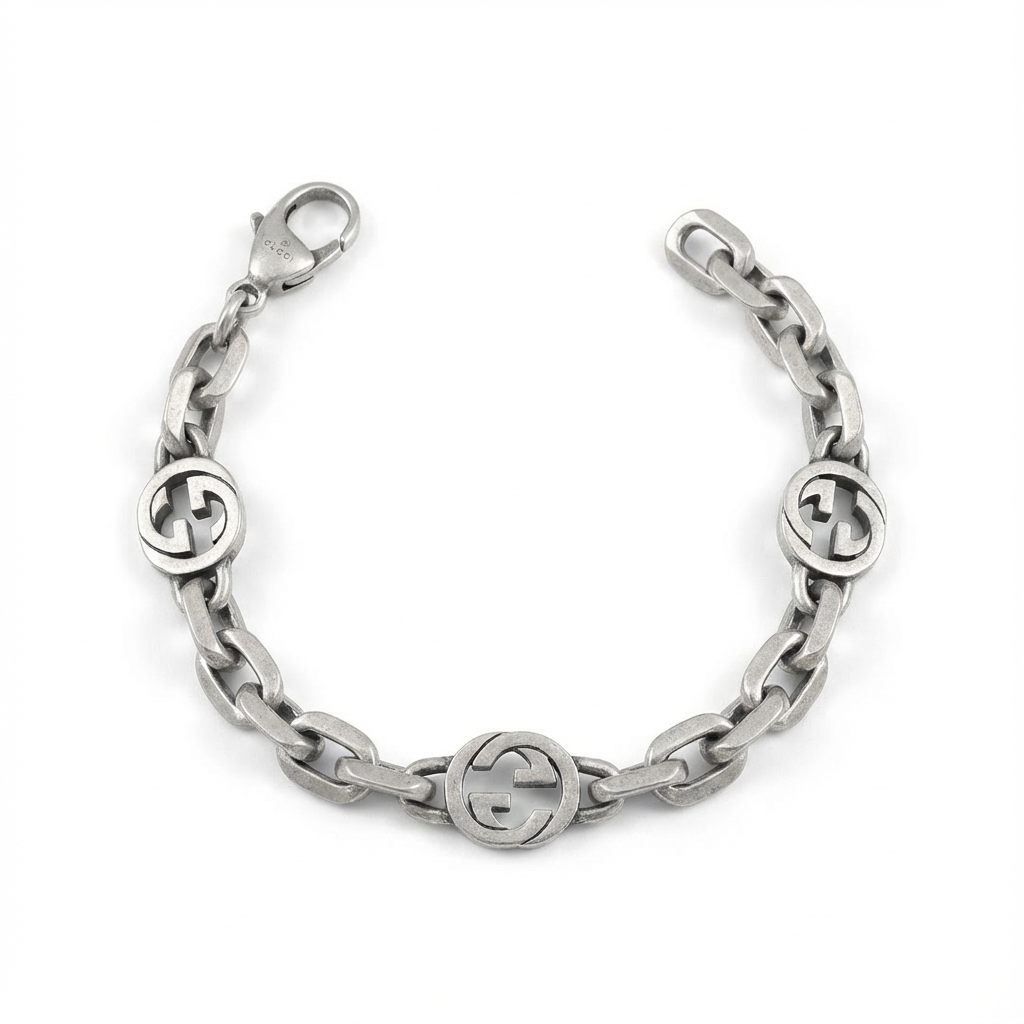 Gucci Interlocking chain bracelet with interlocking G logo on a white background