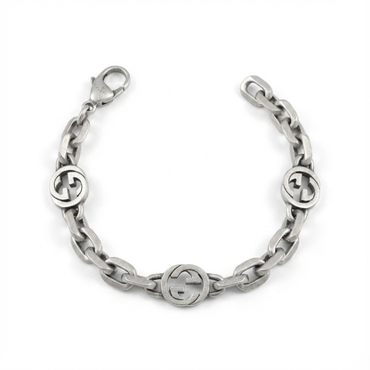 Gucci Interlocking chain bracelet with interlocking G logo on a white background