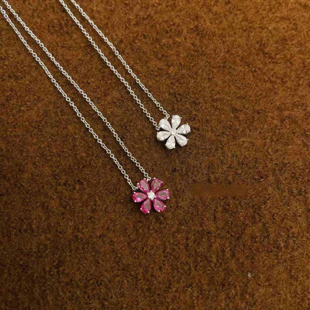 “Harry Winston Forget-Me-Not diamond pendant necklace flat lay”