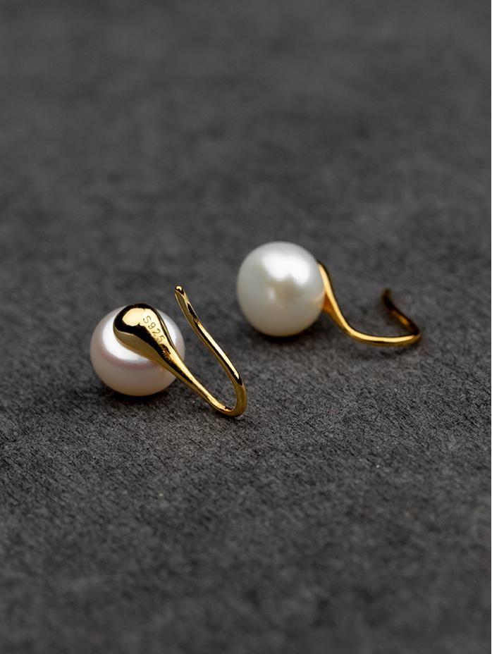 Close-Up of Natural Pearl Stud Earrings in Sterling Silver