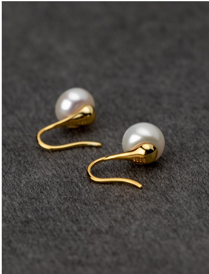 Close-Up of Natural Pearl Stud Earrings in Sterling Silver