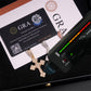 Diamond appraisal tool with a diamond and GRA certificate on a black surface