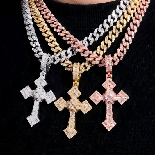Three gold cross pendants on a black background