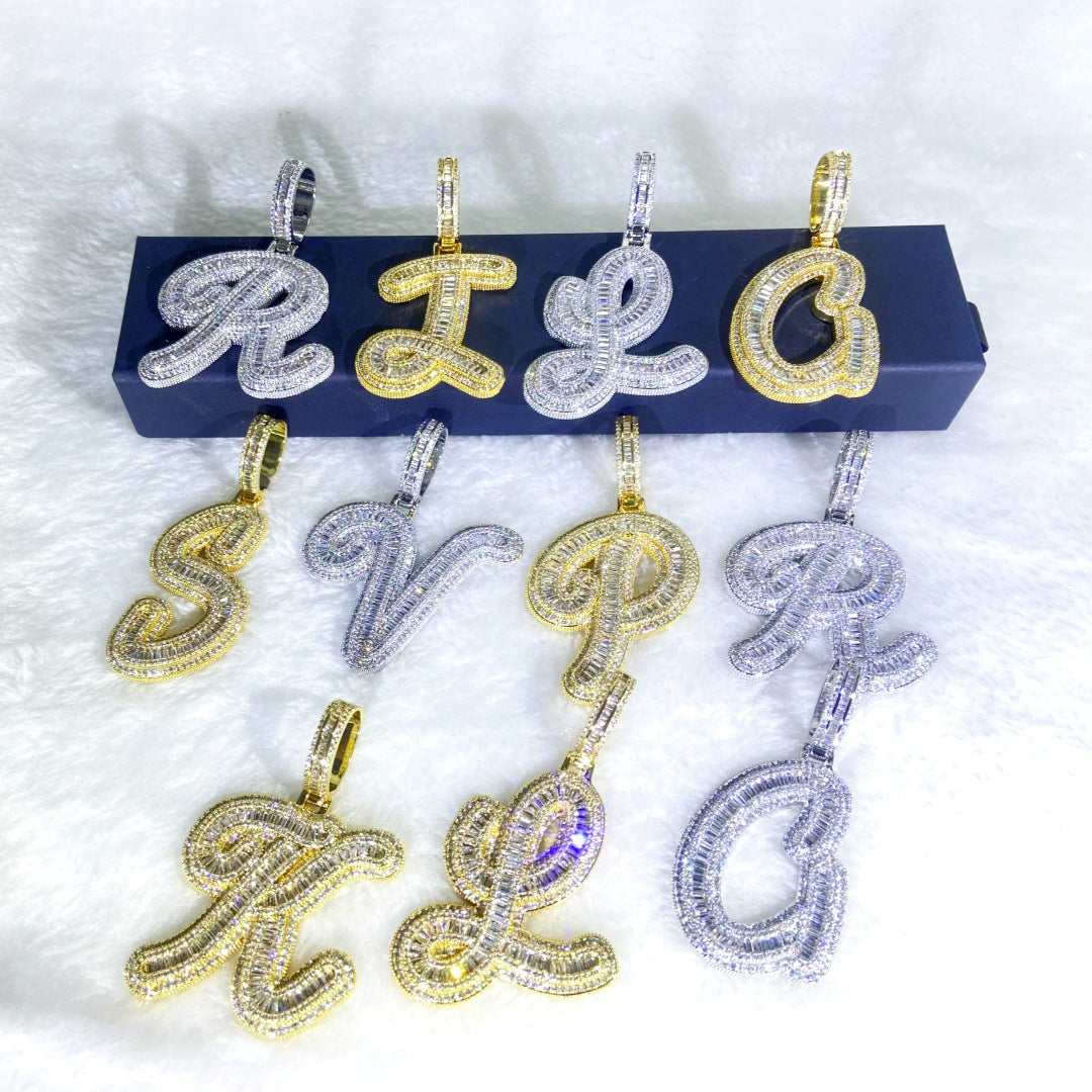 Gold and silver letter pendants on a stand with 'RLG' on a white background