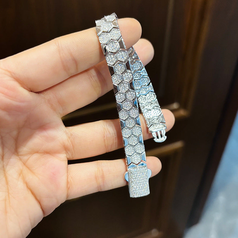 Extreme close-up of 2-3 beads showing the honeycomb-cut faceting in detail.