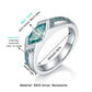 Silver ring with teal gemstone and measurements on a white background