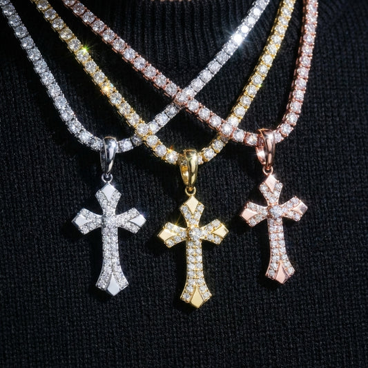Three cross pendants on diamond-studded necklaces against a black background