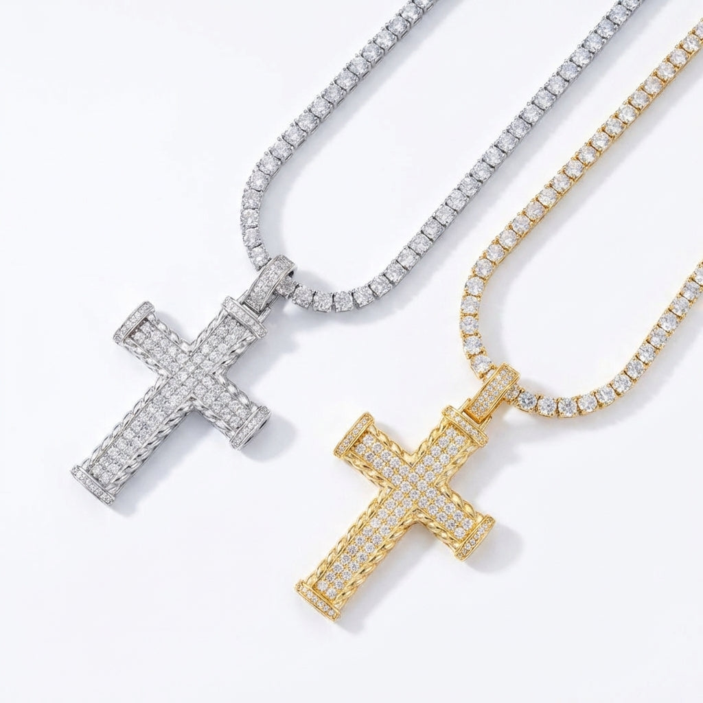 Two diamond-studded cross pendants on chains against a white background