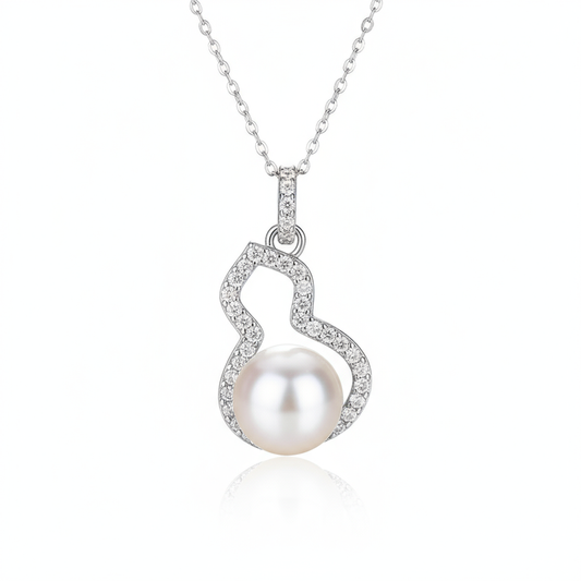 Pearl necklace with silver heart-shaped pendant on a white background