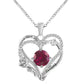Heart-shaped silver pendant with a red gemstone and 'I love you' engraving on a white background
