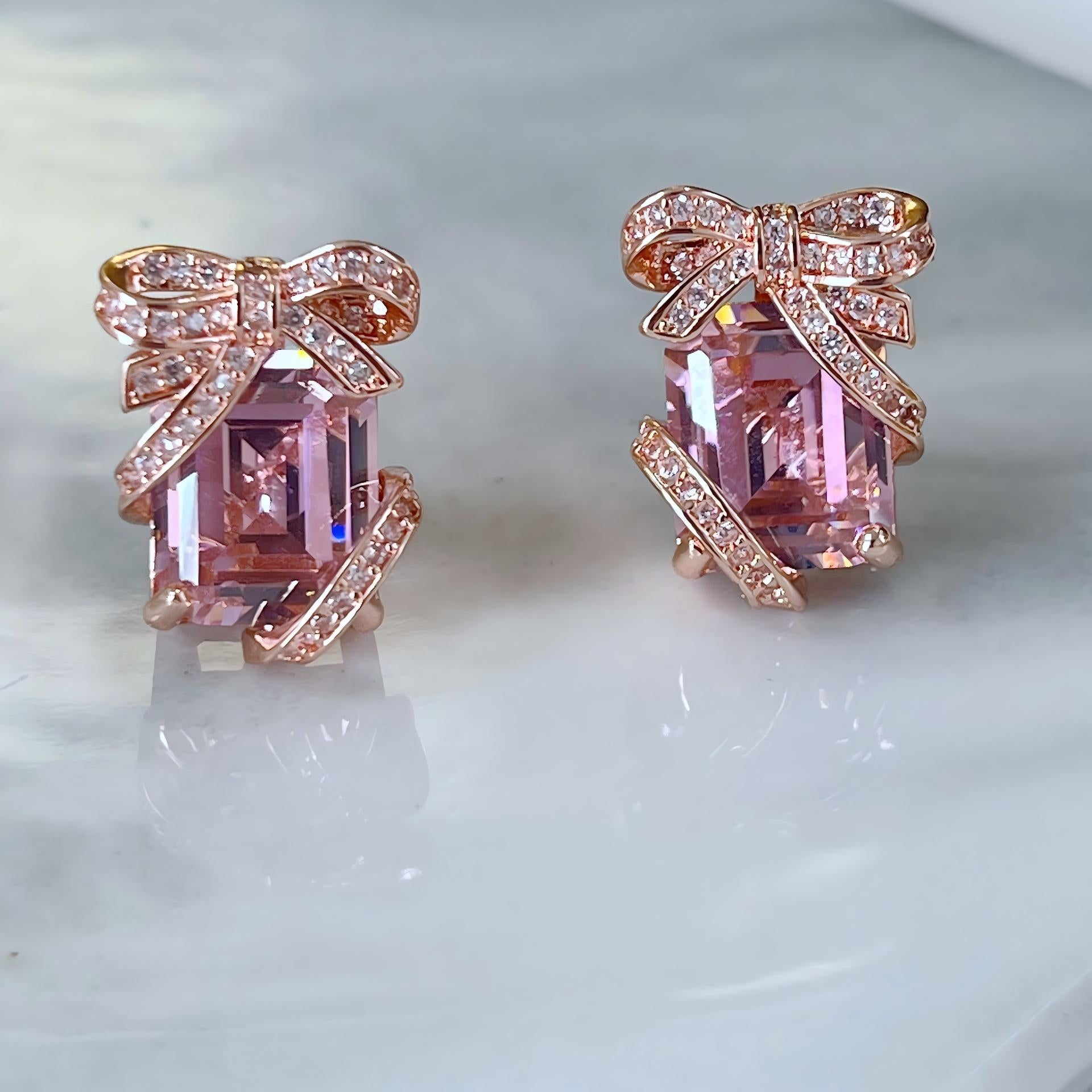 Clean shot of studs on a neutral or festive background (e.g., white marble or dark green velvet), highlighting the gift box shape and green pavé sparkle. Alt: “KATE SPADE Pavé Emerald Present Stud Earrings – Green Gift Box Design.”