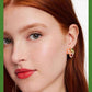 Earrings on a soft white or pale pink background, showcasing the vibrant multicolor floral cluster. Alt: “Kate Spade Abloom in Color Floral Cluster Stud Earrings – Multicolor Enamel Flower Jewelry.”