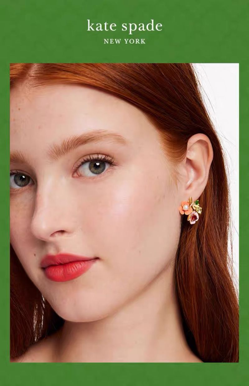 Earrings on a soft white or pale pink background, showcasing the vibrant multicolor floral cluster. Alt: “Kate Spade Abloom in Color Floral Cluster Stud Earrings – Multicolor Enamel Flower Jewelry.”