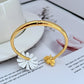 Bracelet on a clean white or soft honeycomb-patterned background, highlighting the enamel bee charm. Alt: “Kate Spade Bee Bracelet – Gold Enamel Bee Charm Jewelry.”