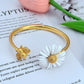 Bracelet on a clean white or soft honeycomb-patterned background, highlighting the enamel bee charm. Alt: “Kate Spade Bee Bracelet – Gold Enamel Bee Charm Jewelry.”