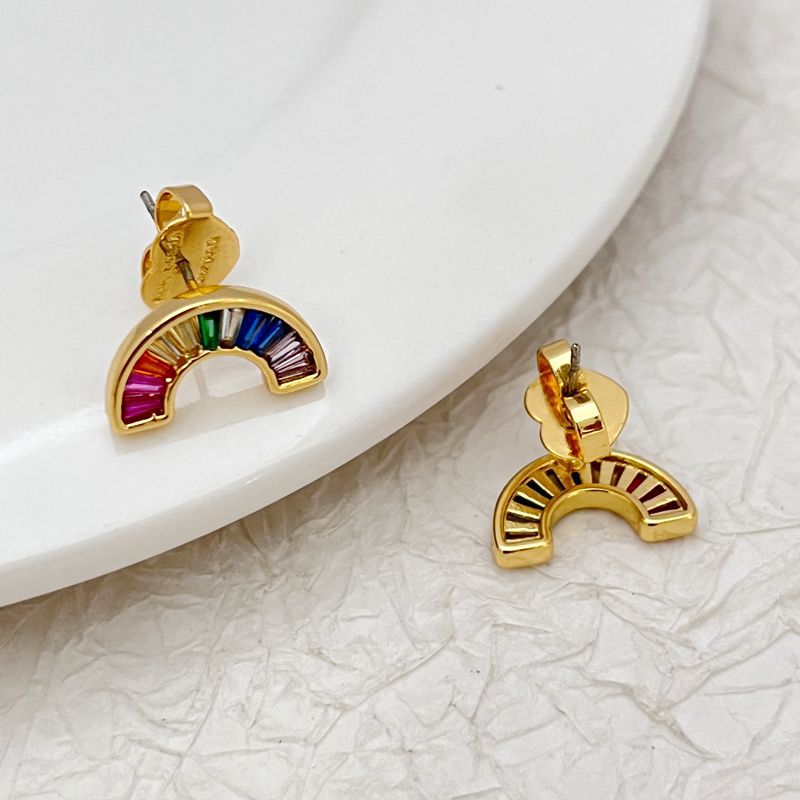  Macro shot focused on the ring pendant, highlighting each of the seven colored crystals and their sparkle.